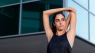 Overhead Tricep Stretch. (Image via Freepik)